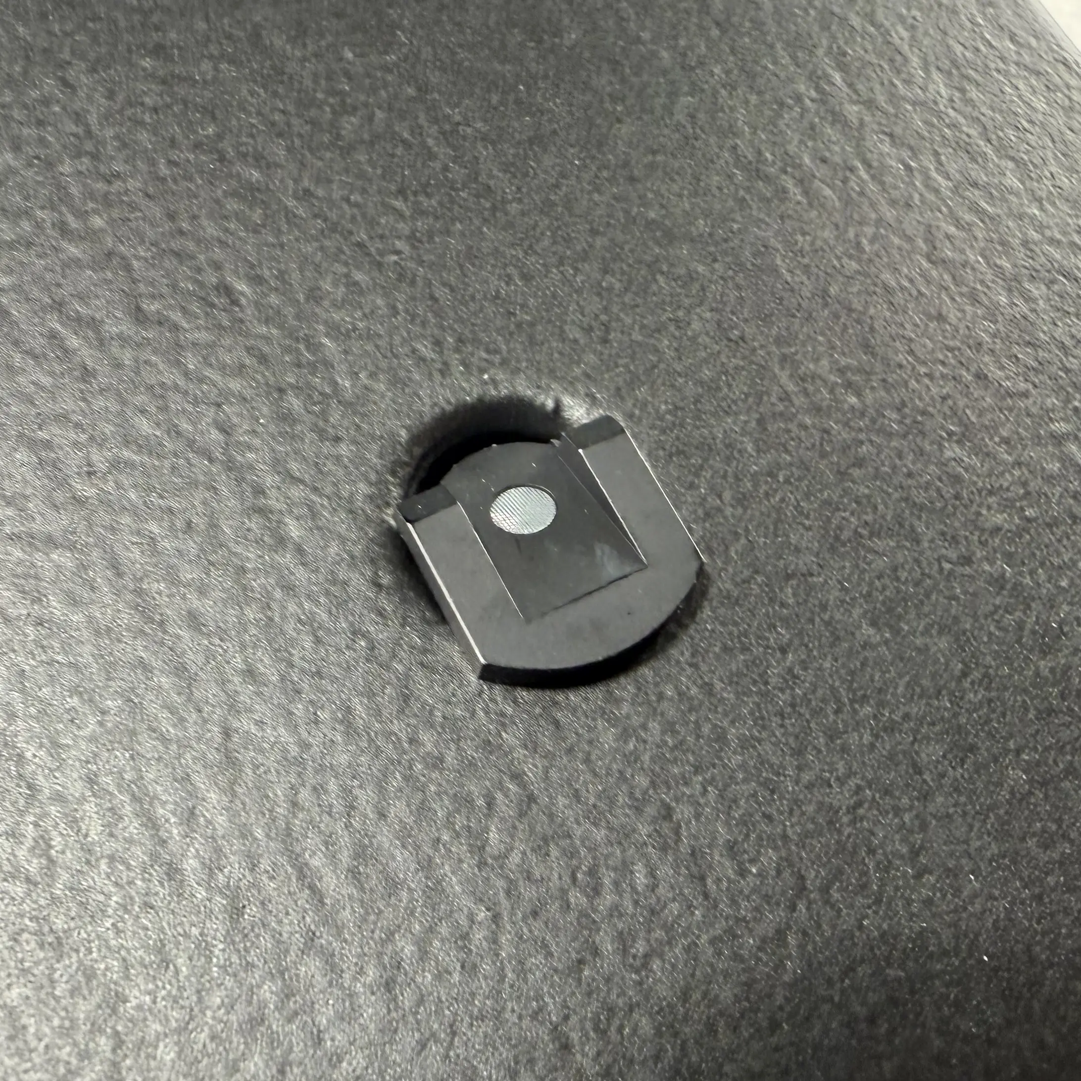 Close-up of a laser reflector on the trade show exhibit for precise alignment of the projection on the mold