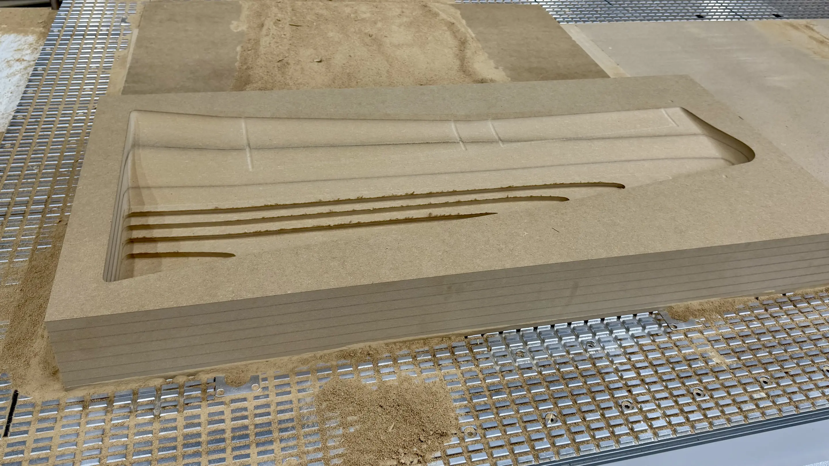 Glued MDF block with partially finished CNC-finished wing negative mold